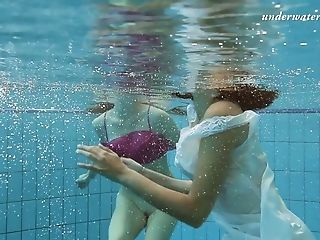 Attractive Bombshells Sima Lastova And Her Gf Unclothe Under The Water